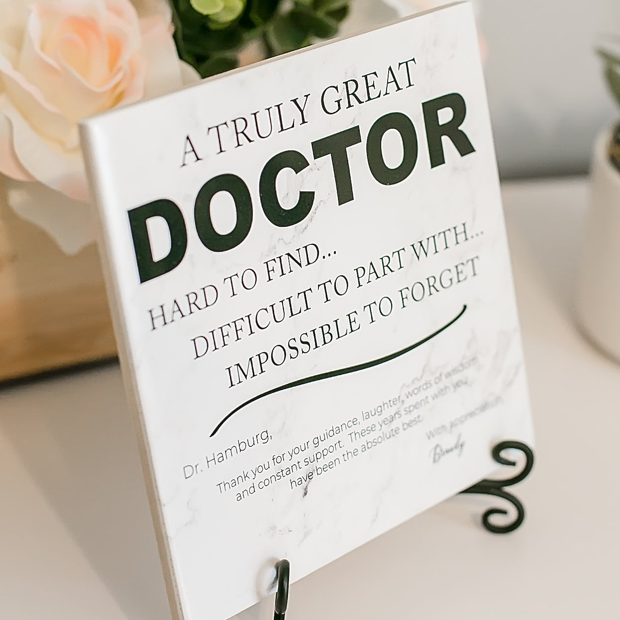 a sign on a table that says a truly great doctor hard to find