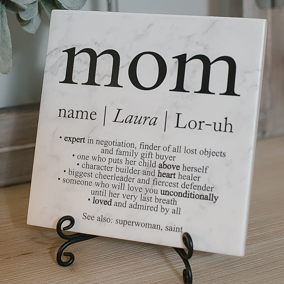 a marble plaque with the words mom on it